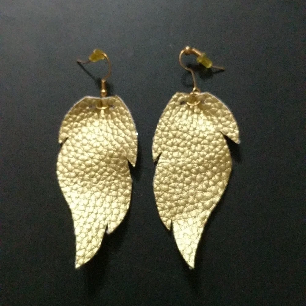 𝅺Gold Tone Soft Leather Wing Statement Earrings